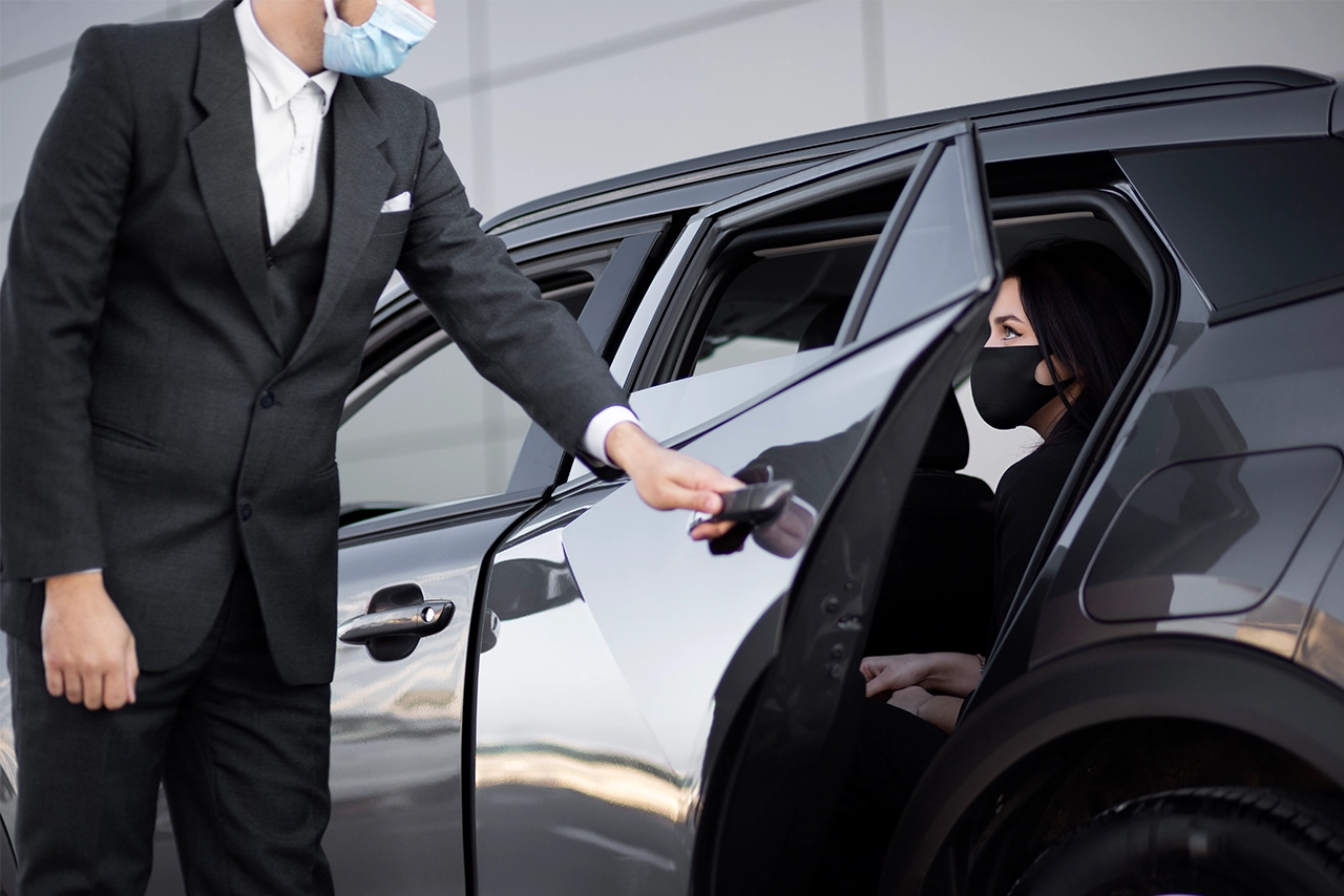 Chauffeur Providing Door-to-Door Service