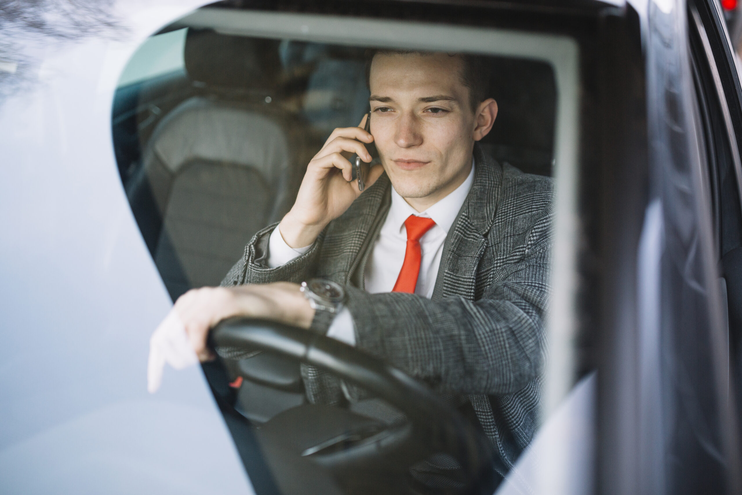 Professional Chauffeur in Luxury Limo